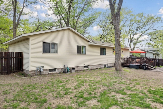 6242 Pecan St, North Branch, MN 55056 - rear view of house featuring fence and a wooden deck