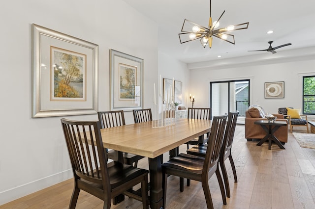 dining space featuring a chandelier, light wood-style flooring, recessed lighting, and baseboards