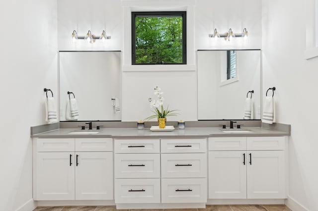 full bathroom featuring double vanity