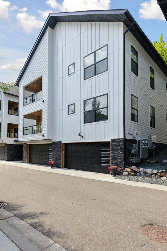 view of building exterior with an attached garage