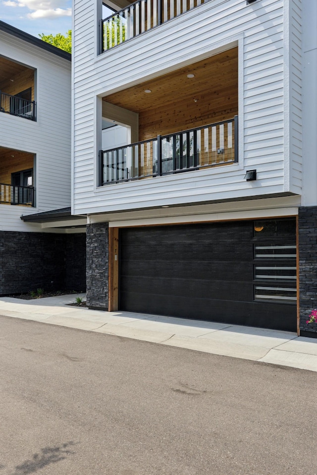 view of property featuring an attached garage