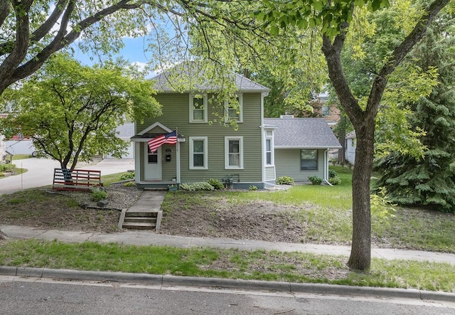212 4, Montevideo, MN 56265 - view of front of house with a shingled roof