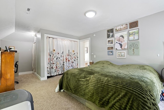 212 4, Montevideo, MN 56265 - carpeted bedroom featuring baseboards and lofted ceiling
