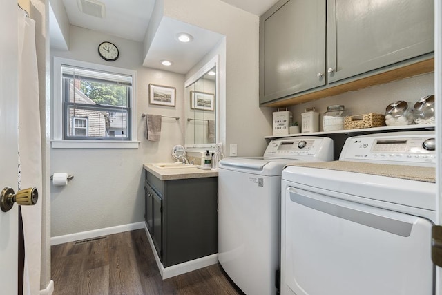212 4, Montevideo, MN 56265 - laundry room with washer and dryer, dark wood-style flooring, and baseboards