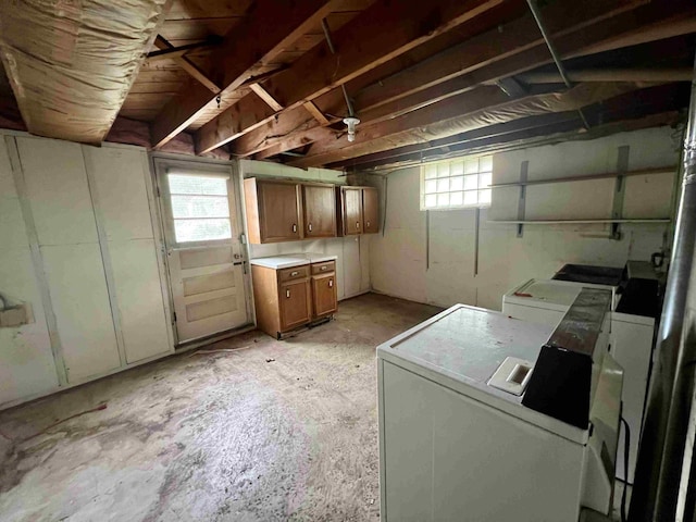 below grade area with washer and dryer