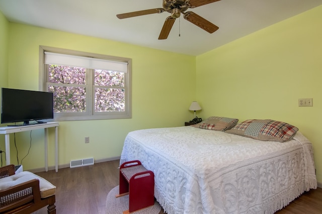 207 2nd Ave W, Balsam Lake, WI 54810 - bedroom with wood finished floors, baseboards, and a ceiling fan