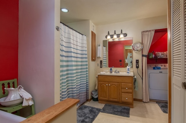 207 2nd Ave W, Balsam Lake, WI 54810 - bathroom with washer / clothes dryer, vanity, and a shower with shower curtain
