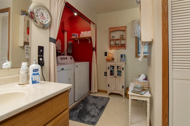 207 2nd Ave W, Balsam Lake, WI 54810 - laundry room with separate washer and dryer and light tile patterned floors
