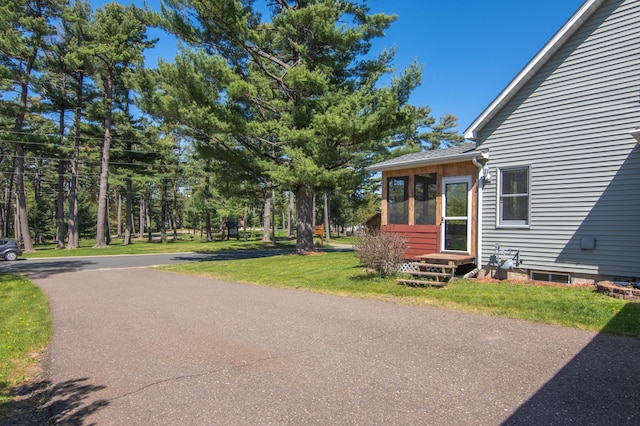 207 2nd Ave W, Balsam Lake, WI 54810 - exterior space featuring entry steps and a lawn