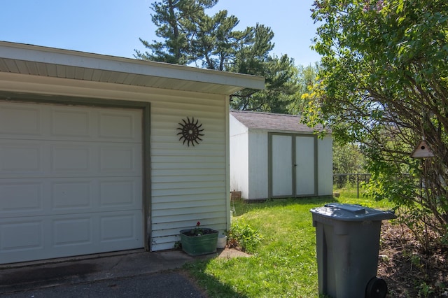 207 2nd Ave W, Balsam Lake, WI 54810 - garage featuring a shed