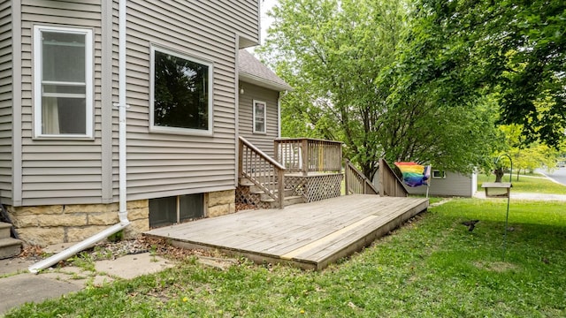 deck featuring a lawn