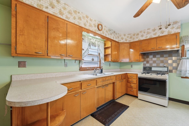 4518 Colfax Ave N, Minneapolis, MN 55412 - kitchen with white gas range oven, a sink, light countertops, brown cabinets, and open shelves