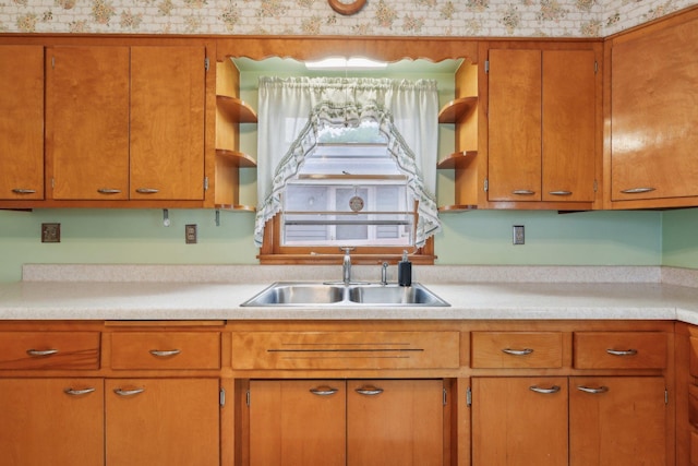 4518 Colfax Ave N, Minneapolis, MN 55412 - kitchen with open shelves, a sink, light countertops, and brown cabinets