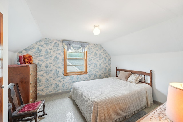 4518 Colfax Ave N, Minneapolis, MN 55412 - carpeted bedroom with vaulted ceiling and baseboards