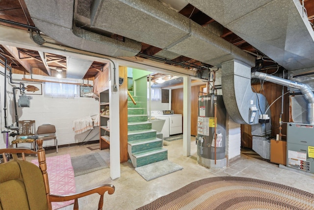 4518 Colfax Ave N, Minneapolis, MN 55412 - basement featuring gas water heater, independent washer and dryer, stairway, gas meter, and heating unit