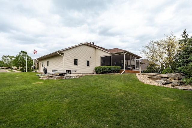 2592 Aspen Pl SW, Rochester, MN 55902 - rear view of house featuring a sunroom and a yard