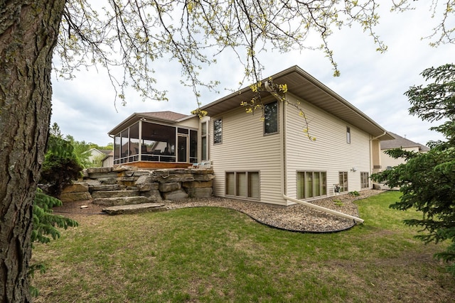 2592 Aspen Pl SW, Rochester, MN 55902 - back of property featuring a sunroom and a lawn