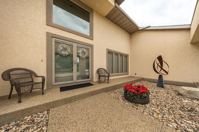 2592 Aspen Pl SW, Rochester, MN 55902 - property entrance featuring stucco siding, french doors, and a patio area