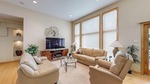 2592 Aspen Pl SW, Rochester, MN 55902 - living room featuring baseboards, light wood finished floors, and recessed lighting