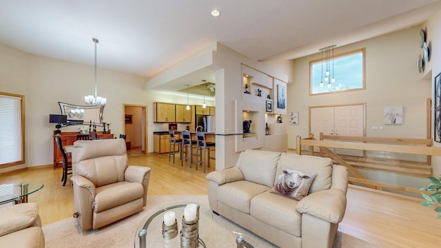 2592 Aspen Pl SW, Rochester, MN 55902 - living room featuring a chandelier and light wood finished floors