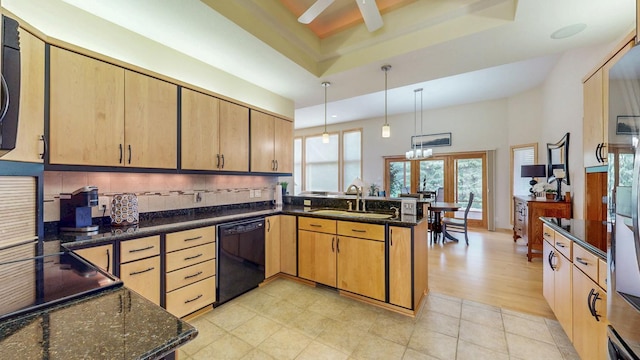 2592 Aspen Pl SW, Rochester, MN 55902 - kitchen featuring dishwasher, a sink, a peninsula, a ceiling fan, and decorative backsplash