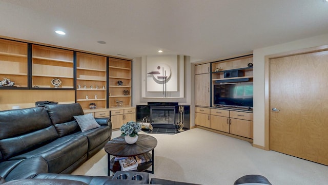 2592 Aspen Pl SW, Rochester, MN 55902 - living area with light carpet, a fireplace with flush hearth, and recessed lighting