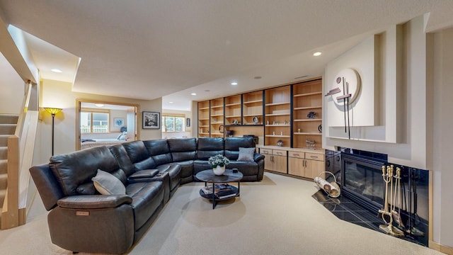 2592 Aspen Pl SW, Rochester, MN 55902 - living area with light carpet, recessed lighting, stairway, and a fireplace with flush hearth