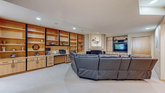 2592 Aspen Pl SW, Rochester, MN 55902 - living room featuring light carpet, recessed lighting, and a fireplace