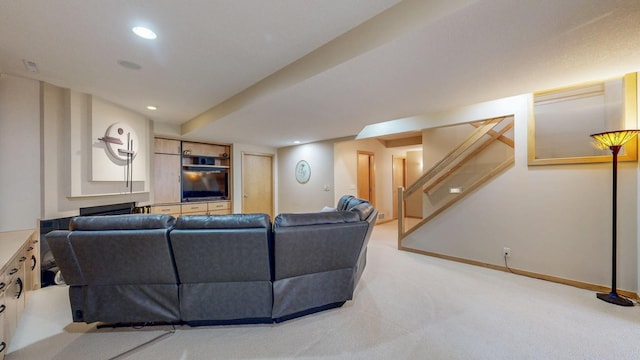 2592 Aspen Pl SW, Rochester, MN 55902 - living room with light colored carpet, stairway, recessed lighting, and baseboards