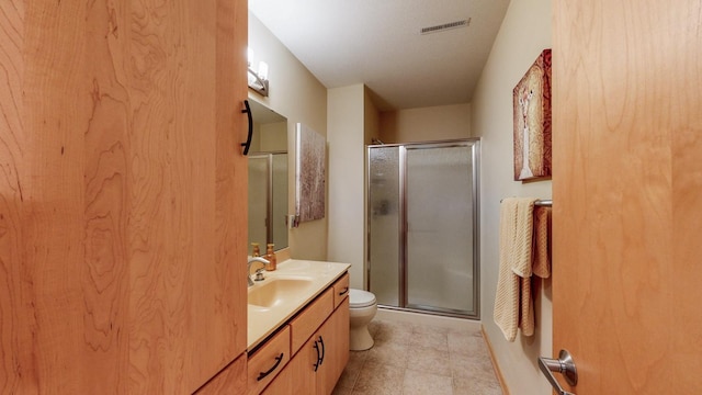 2592 Aspen Pl SW, Rochester, MN 55902 - full bathroom featuring a stall shower, vanity, and toilet