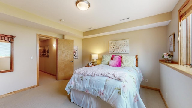 2592 Aspen Pl SW, Rochester, MN 55902 - bedroom with carpet floors, multiple windows, and baseboards