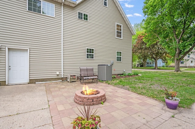 114 3rd Ave E, Truman, MN 56088 - view of patio with central AC and an outdoor fire pit
