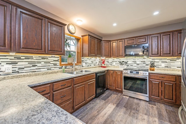 114 3rd Ave E, Truman, MN 56088 - kitchen featuring black appliances, a sink, dark wood finished floors, decorative backsplash, and recessed lighting