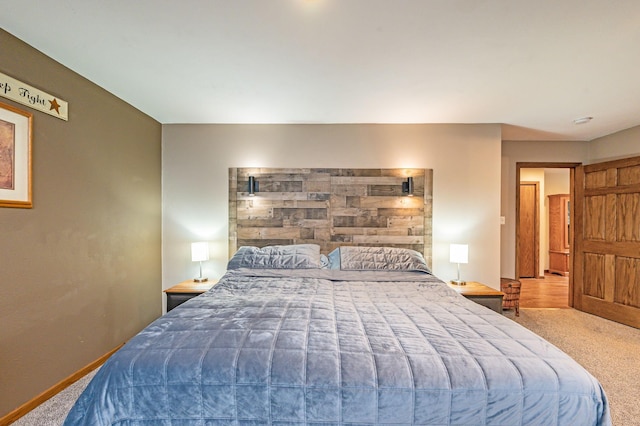 114 3rd Ave E, Truman, MN 56088 - carpeted bedroom featuring baseboards