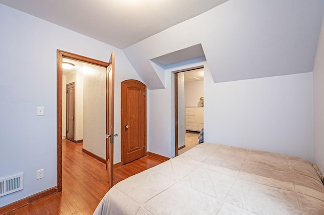 114 3rd Ave E, Truman, MN 56088 - bedroom featuring wood finished floors and baseboards