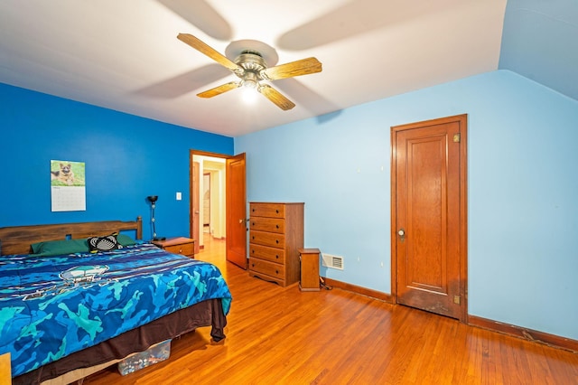 114 3rd Ave E, Truman, MN 56088 - bedroom with light wood-style flooring, ceiling fan, and baseboards