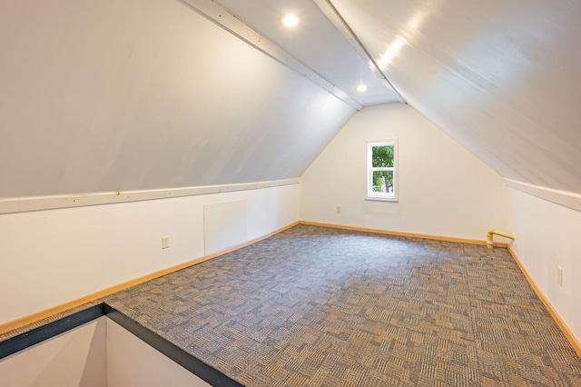 114 3rd Ave E, Truman, MN 56088 - bonus room featuring carpet floors, vaulted ceiling, baseboards, and recessed lighting