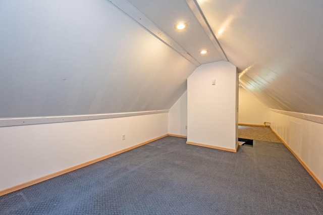 114 3rd Ave E, Truman, MN 56088 - bonus room featuring vaulted ceiling, baseboards, carpet flooring, and recessed lighting