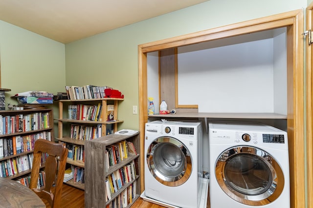724 16th St NE, Rochester, MN 55906 - laundry area with washer and dryer and wood finished floors