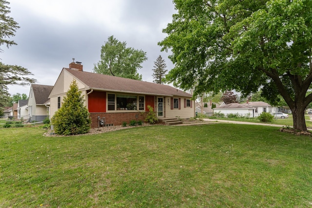 724 16th St NE, Rochester, MN 55906 - ranch-style house with a chimney and brick siding