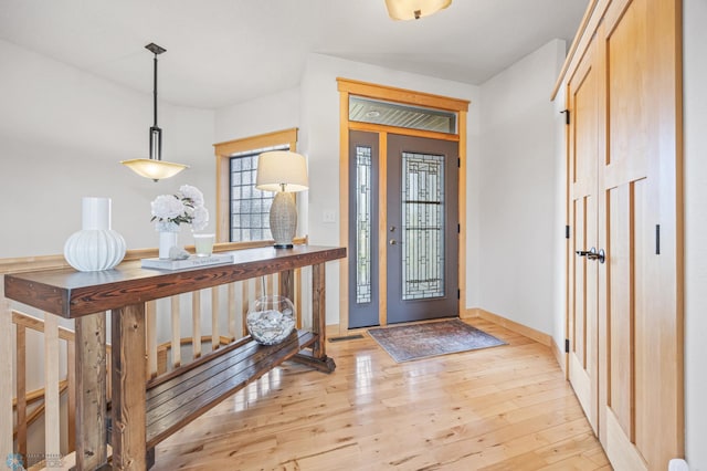 405 12th St NE, Dilworth, MN 56529 - entryway with light wood finished floors