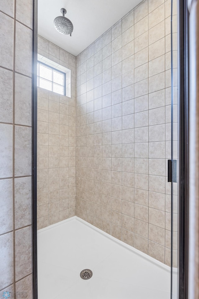 405 12th St NE, Dilworth, MN 56529 - bathroom featuring tiled shower