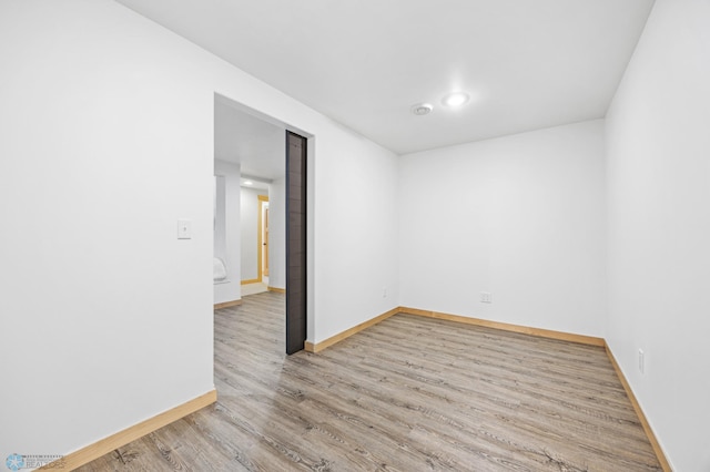 405 12th St NE, Dilworth, MN 56529 - empty room with wood finished floors and baseboards
