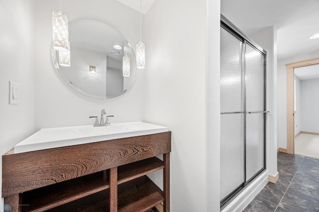405 12th St NE, Dilworth, MN 56529 - bathroom featuring a shower stall, vanity, and baseboards