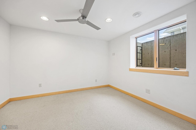405 12th St NE, Dilworth, MN 56529 - spare room with baseboards, recessed lighting, carpet flooring, and ceiling fan