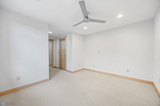 405 12th St NE, Dilworth, MN 56529 - unfurnished room featuring light colored carpet, a ceiling fan, recessed lighting, and baseboards