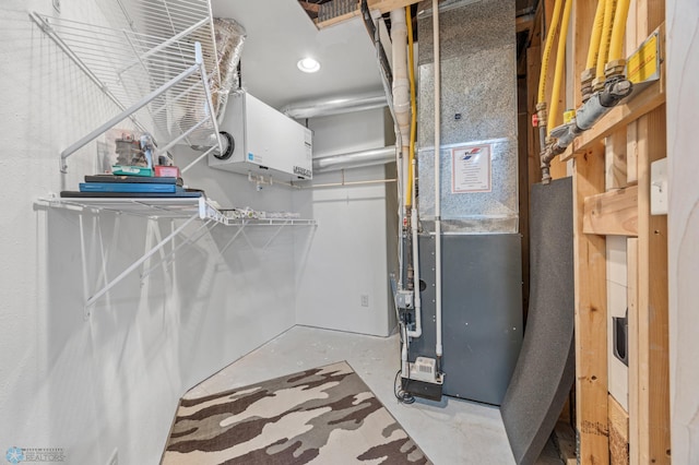 405 12th St NE, Dilworth, MN 56529 - utility room with heating unit and water heater