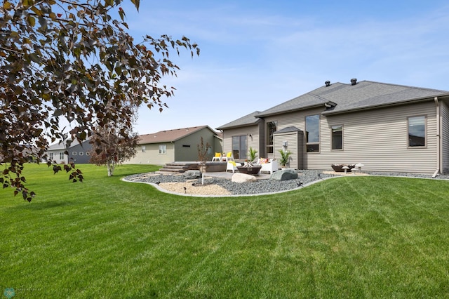405 12th St NE, Dilworth, MN 56529 - rear view of house featuring a lawn, a patio area, an outdoor hangout area, and roof with shingles