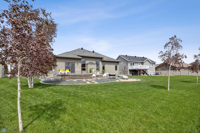 405 12th St NE, Dilworth, MN 56529 - rear view of house featuring a wooden deck and stairs