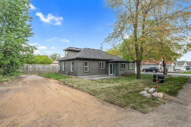309 Shore Dr, Forest Lake, MN 55025 - view of front facade featuring roof with shingles and a patio